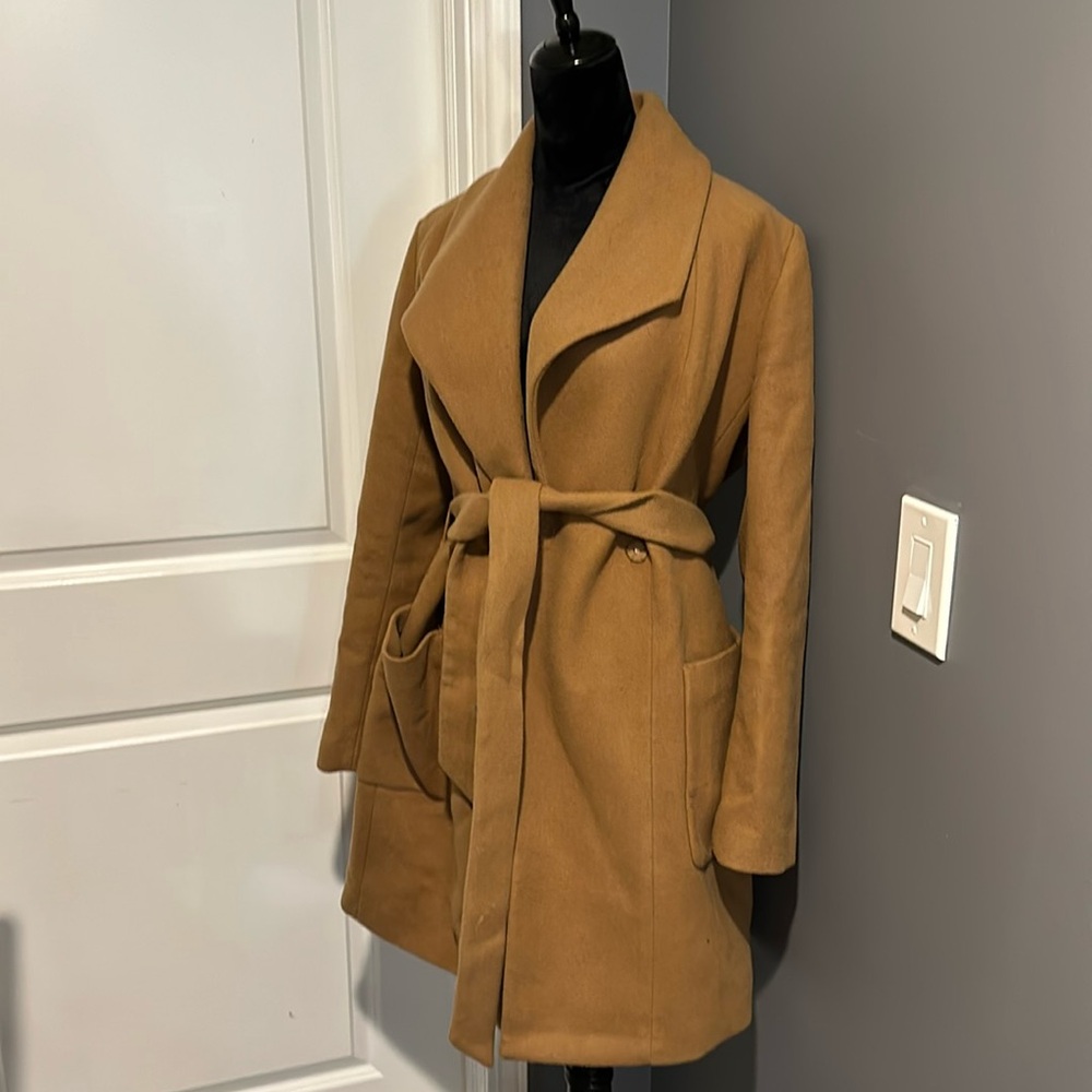 Express winter coat! Camel color The black one just like it on my page.